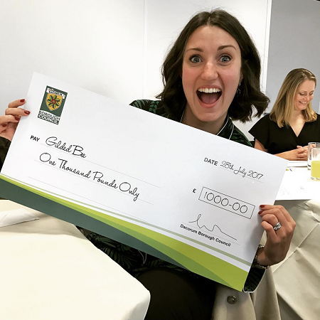 Vicky Thomson of Gilded Bee displays the company's cheque for £1,000 back in 2017