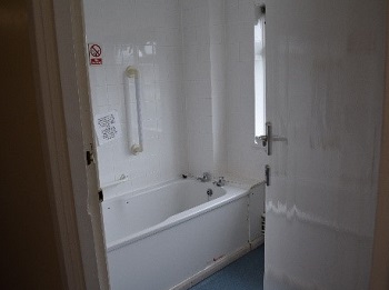 Example of a conforming bathroom and toilet